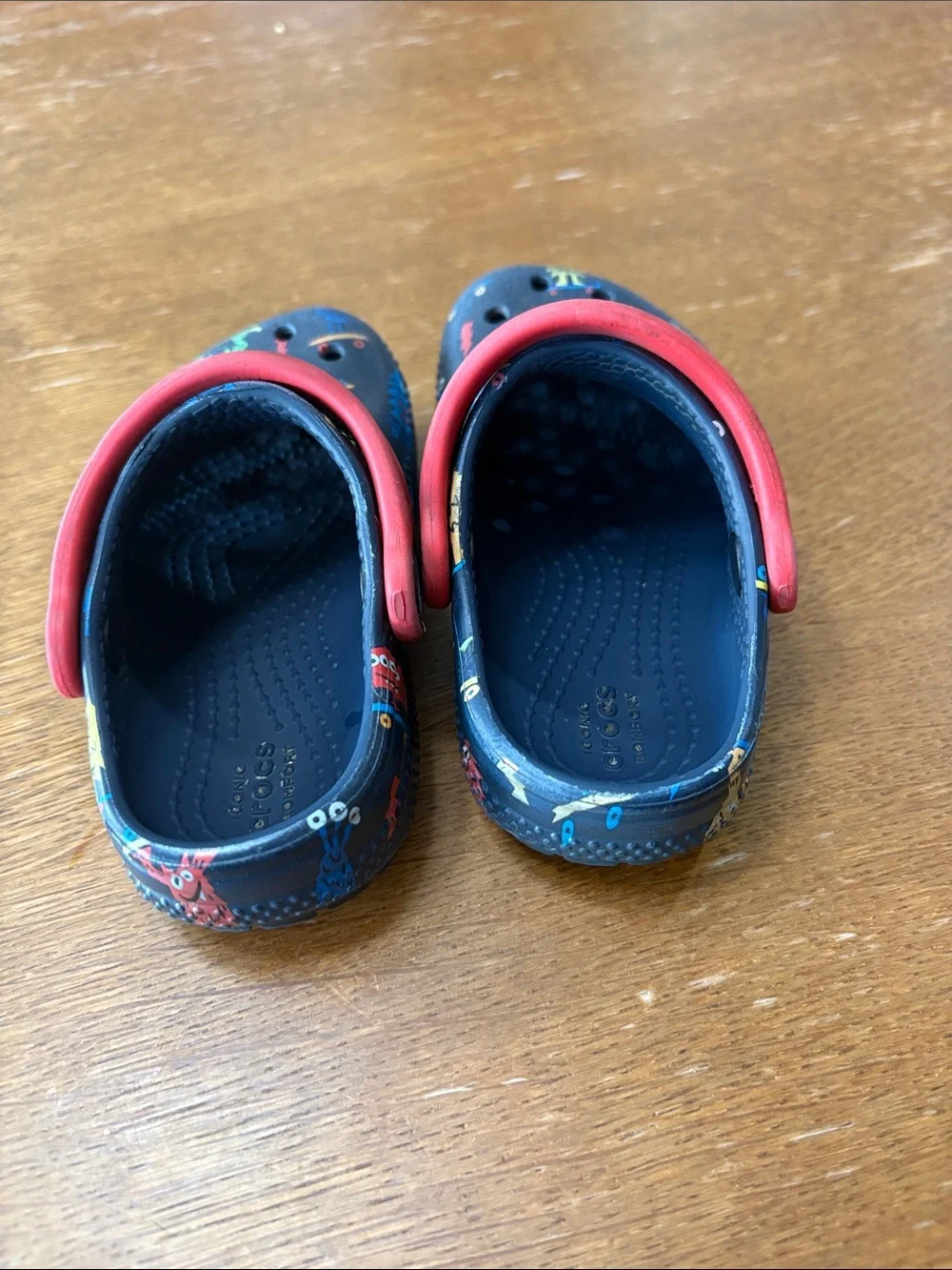 CROCS Navy Kids Clog with Red Strap and Multicolor Monster Print